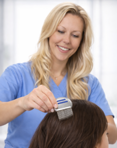 Hair being combed for lice